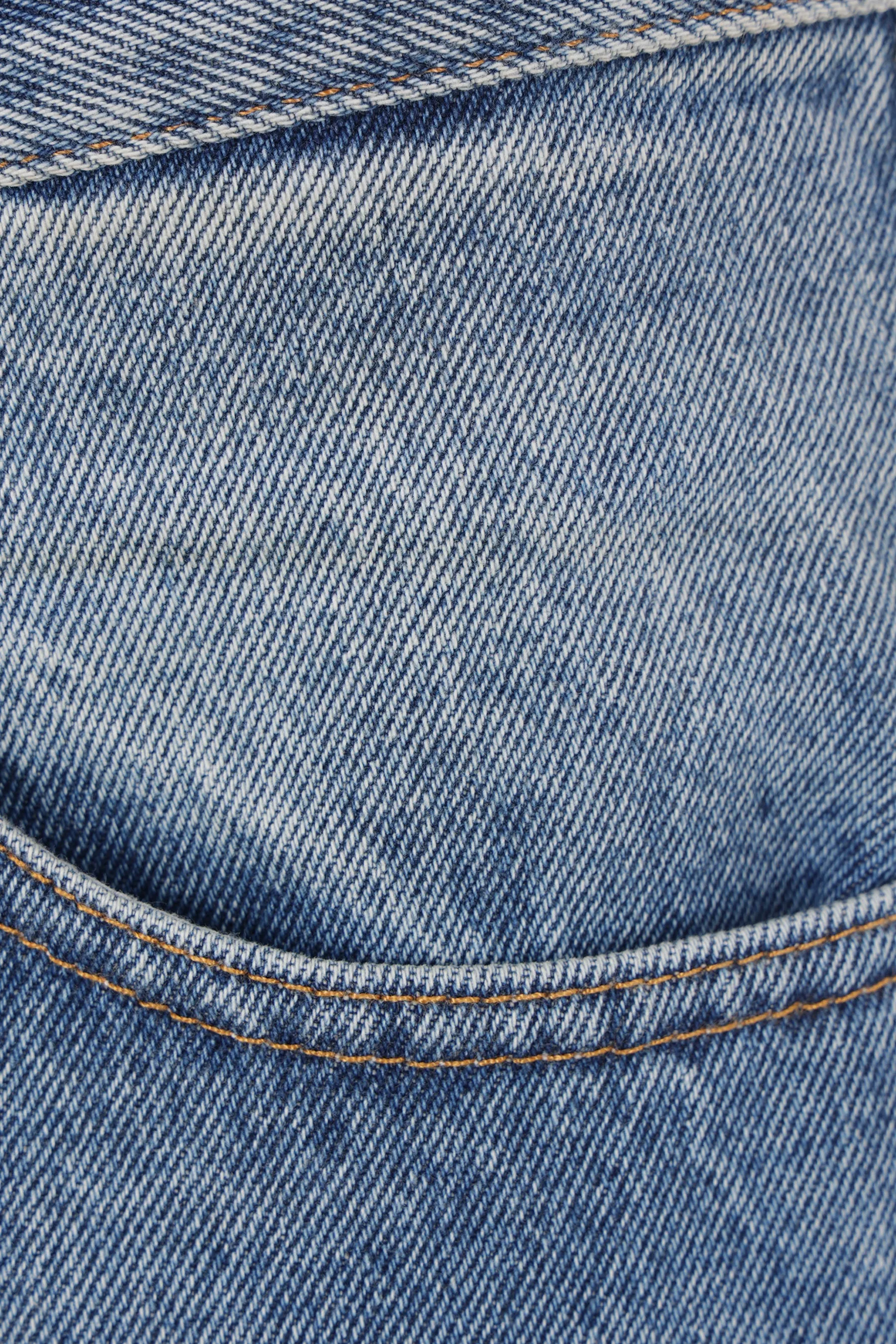 Tapered Distressed Denim Jeans
